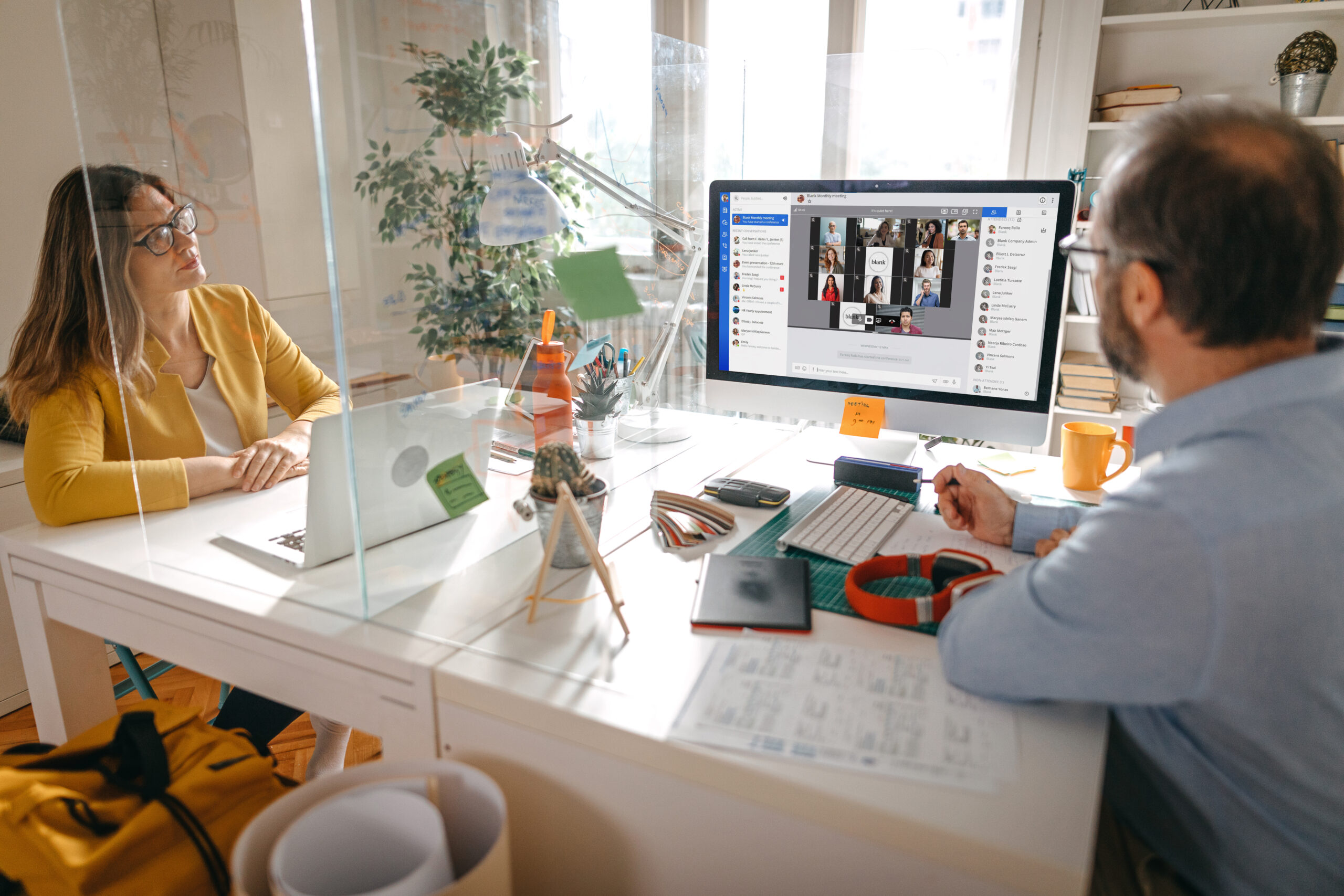 GettyImages-1223455516-office-covid-glass-rainbow-classic-multi-party-group-meeting-ultrahq-6720x4480