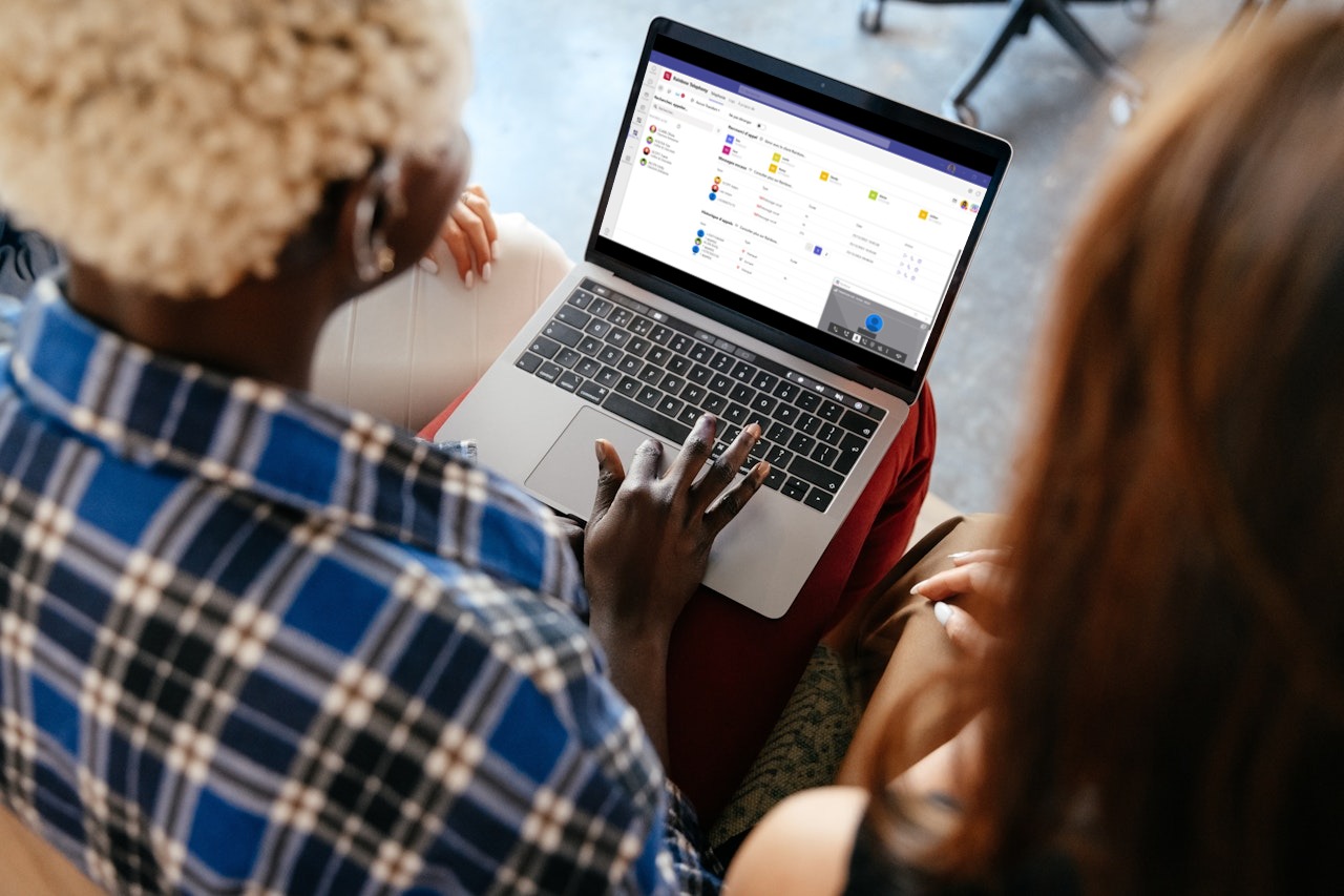 Woman having a call on Rainbow Telephony for MS Teams which creates innovation and digital transformation Woman using Rainbow Telephony for Microsoft Teams while having a call