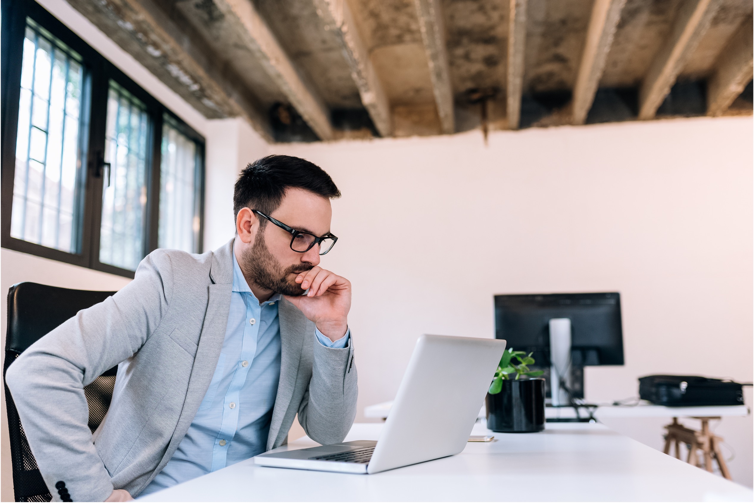 Trust with Customers man scratching head while thinking about what feedback to give